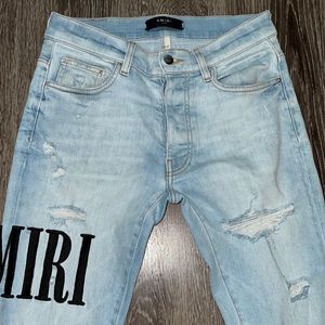 AMIRI
Logo Embroidered Super Light Jeans